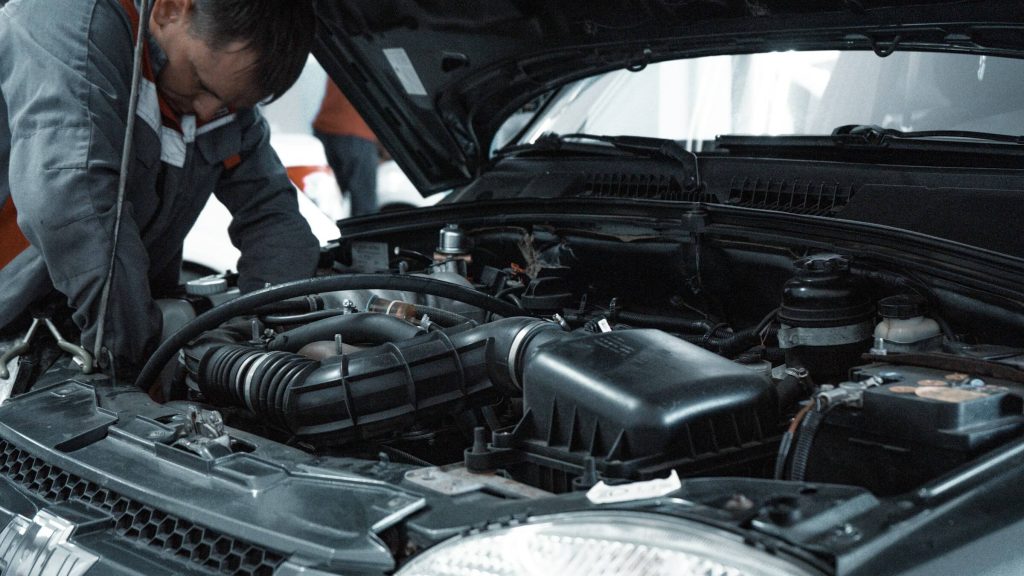remap wigan 11 mechanic working on car engine