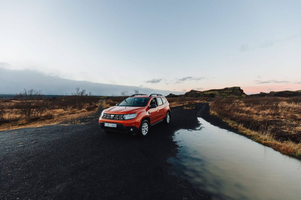 remap wigan 8 orange dacia duster parked outdoors